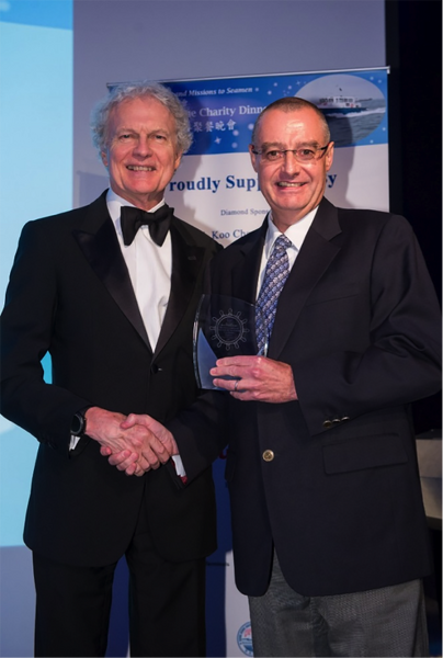 4.1 Mr. John Wood of CLSICO collecting the prize for Hong Kong Ship Manager of the Year from Mr. Anthony Nightingale, Chairman of The Mission to Seafarers, Hong Kong.png