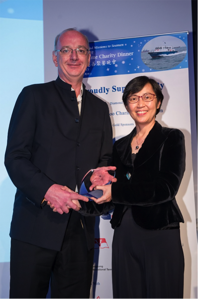 4.2 Mr. Tim Huxley, CEO Wah Kwong receiving Hong Kong Ship Owner 2015 from Ms. Maisie Cheng, Director of Marine Department, HK Government SAR.png